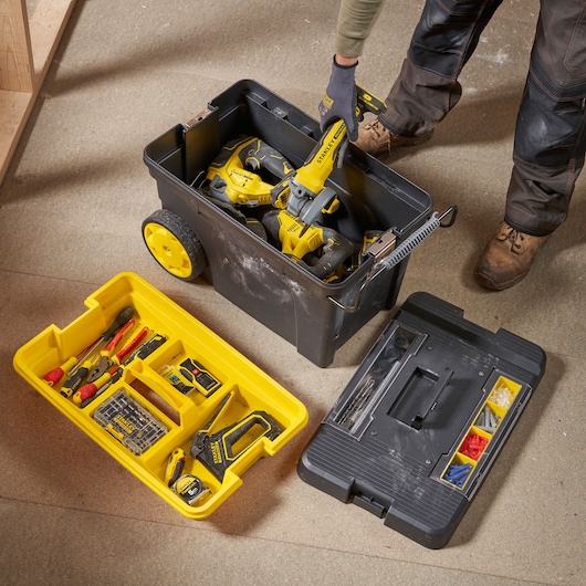 STANLEY 1-92-904 rolling tool box with removable tray and assorted hand tools, photo from above.