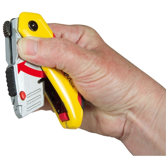 STANLEY 10-825 utility knife with yellow and silver handle held in hand, close-up side angle.