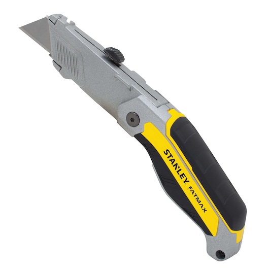 Stanley FatMax utility knife side angle, silver body with black and yellow ergonomic grip, exposed blade