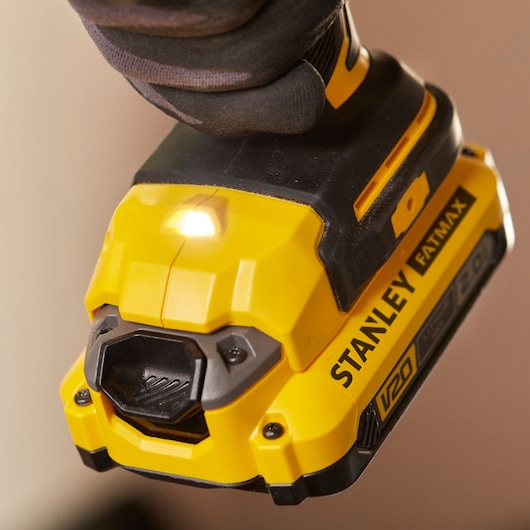 Photo of STANLEY SFMCD720DR2 cordless drill close-up showing yellow and black V20 FATMAX battery.