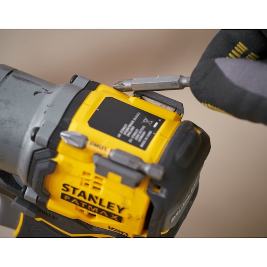Photo of STANLEY SFMCF830D2K FATMAX cordless drill with bit storage, close-up view.