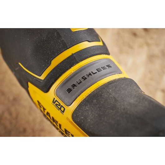 Stanley SFMCS311B-XJ brushless V20 tool close-up, showing yellow and black body details.