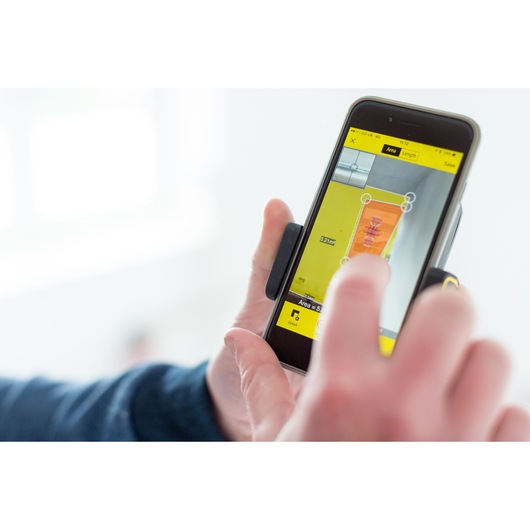 STANLEY STHT1-77366 app interface photography showing measurement tools on smartphone screen.