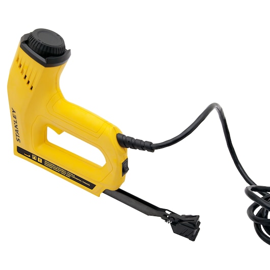 Photo of STANLEY TRE550-B2 yellow electric stapler with power cord, side angle on white background.