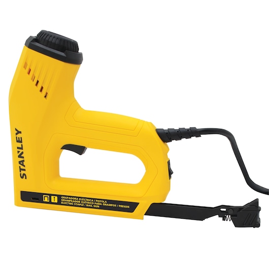 Photo of STANLEY TRE550-B2 yellow electric staple nail gun, side angle, with black cord.